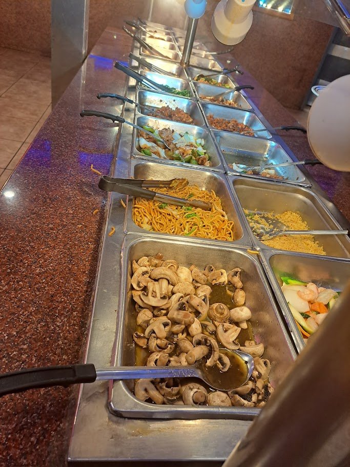 Clean buffet line with stainless steel pans